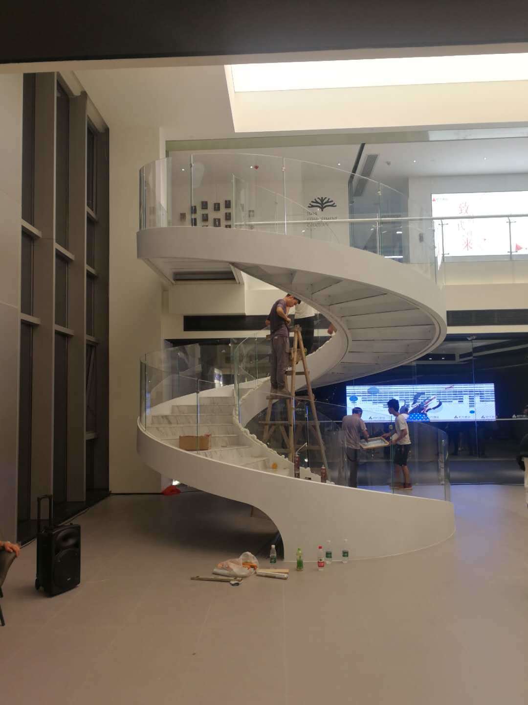 Customized curved glass staircase manufacturers for aprtment