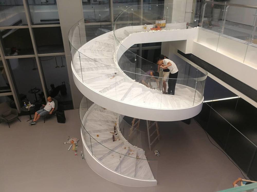Building modern space saving curved stairs