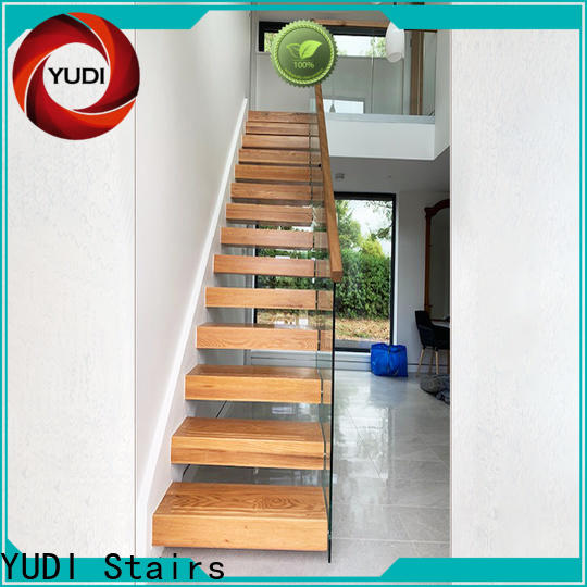 Custom floating oak staircase for villa